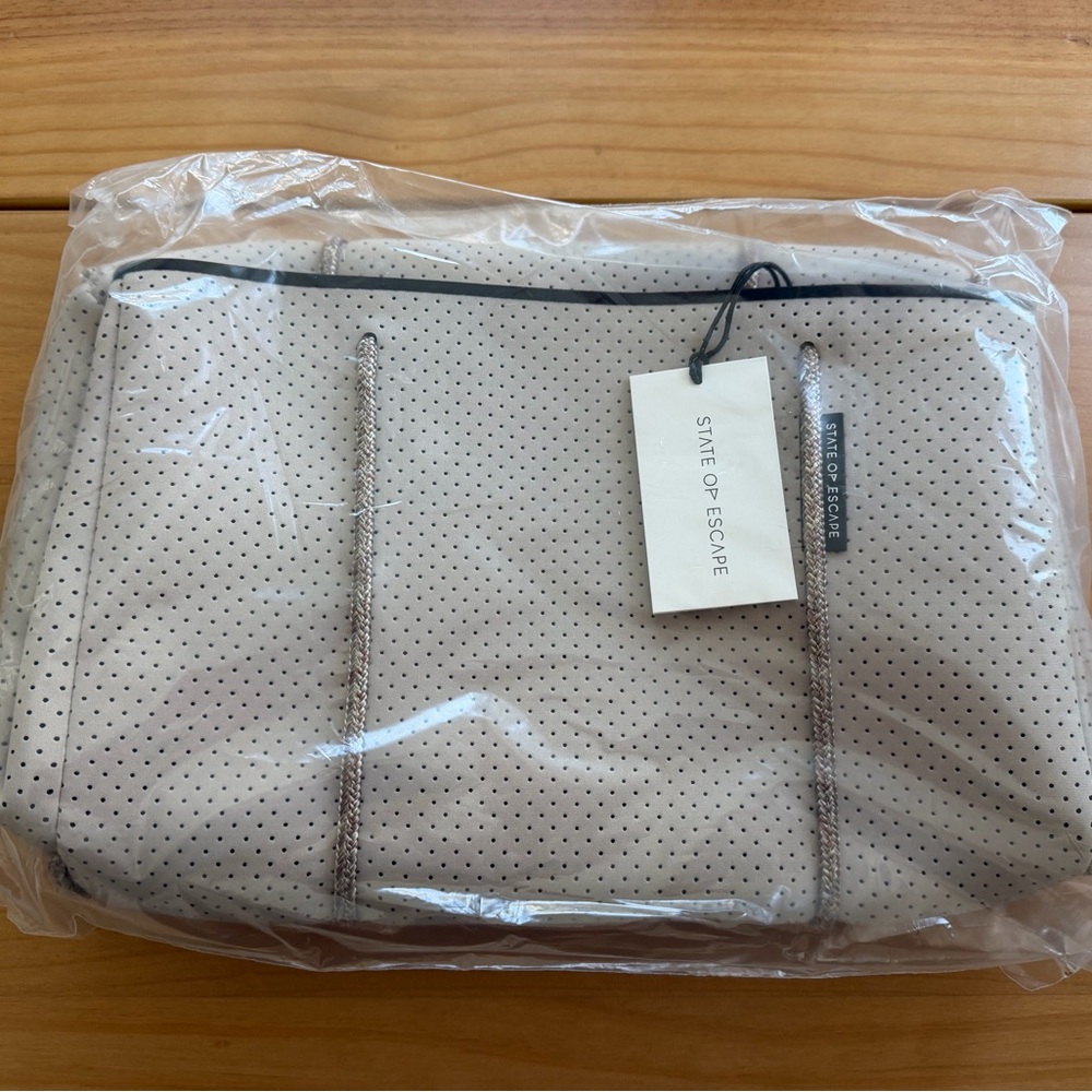 State of Escape Perforated Tan Tote Bag